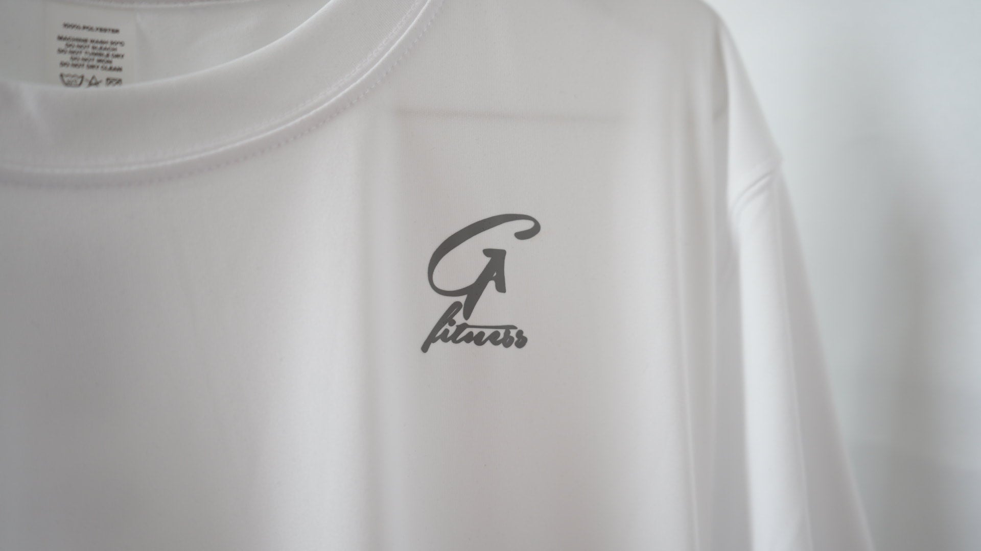 GA Artic white performance top logo